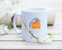 Laden Sie das Bild in den Galerie-Viewer, Feine Keramiktasse " Rotkehlchen im Frühling"