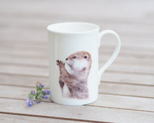 Laden Sie das Bild in den Galerie-Viewer, Porzellantasse "Niedlicher Otter"