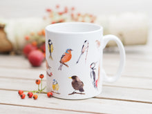 Laden Sie das Bild in den Galerie-Viewer, Feine Keramiktasse "Gartenvögel"